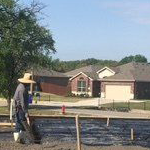 Construction Worker Working On Site