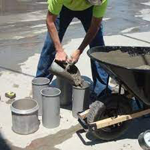 Construction Worker Mixing Material