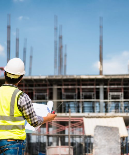 Engineer Holding Blueprint In Hand